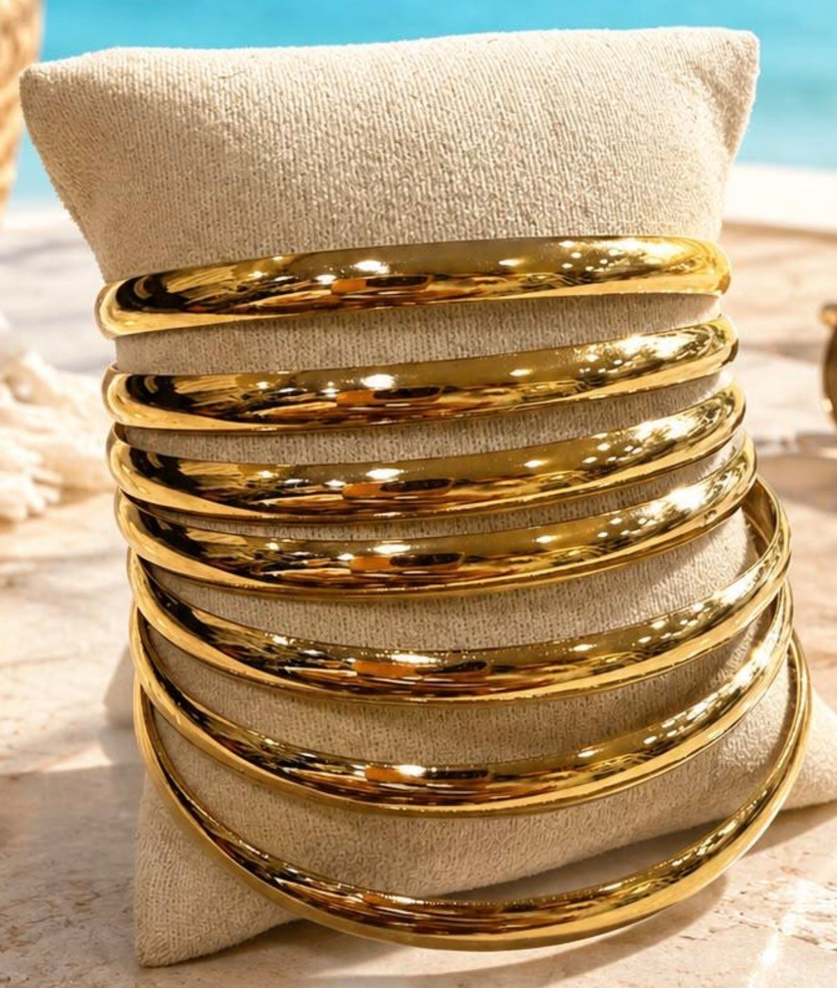 A stack of seven bangles, long lasting all weather proof.